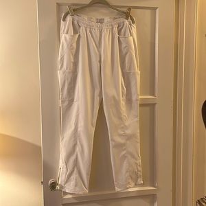 Jaanuu pants-6 pockets, Elastic waist and gold zippers at the ankles